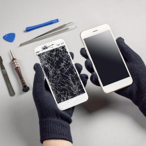 Technician or engineer prepairing to repair and replace new screen broken and cracked screen smartphone prepairing on desk with copy space